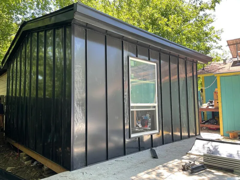 Black standing seam metal wall panels for Metal Roof Installation in White City